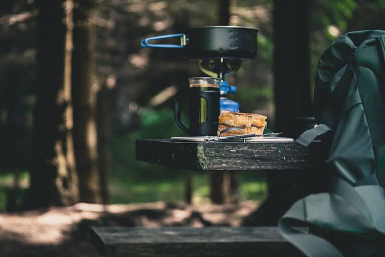 Cooking pot on a portable stove at an outdoor campsite